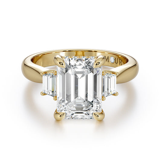 Emerald cut Trillogy with trapezoid cut shoulders