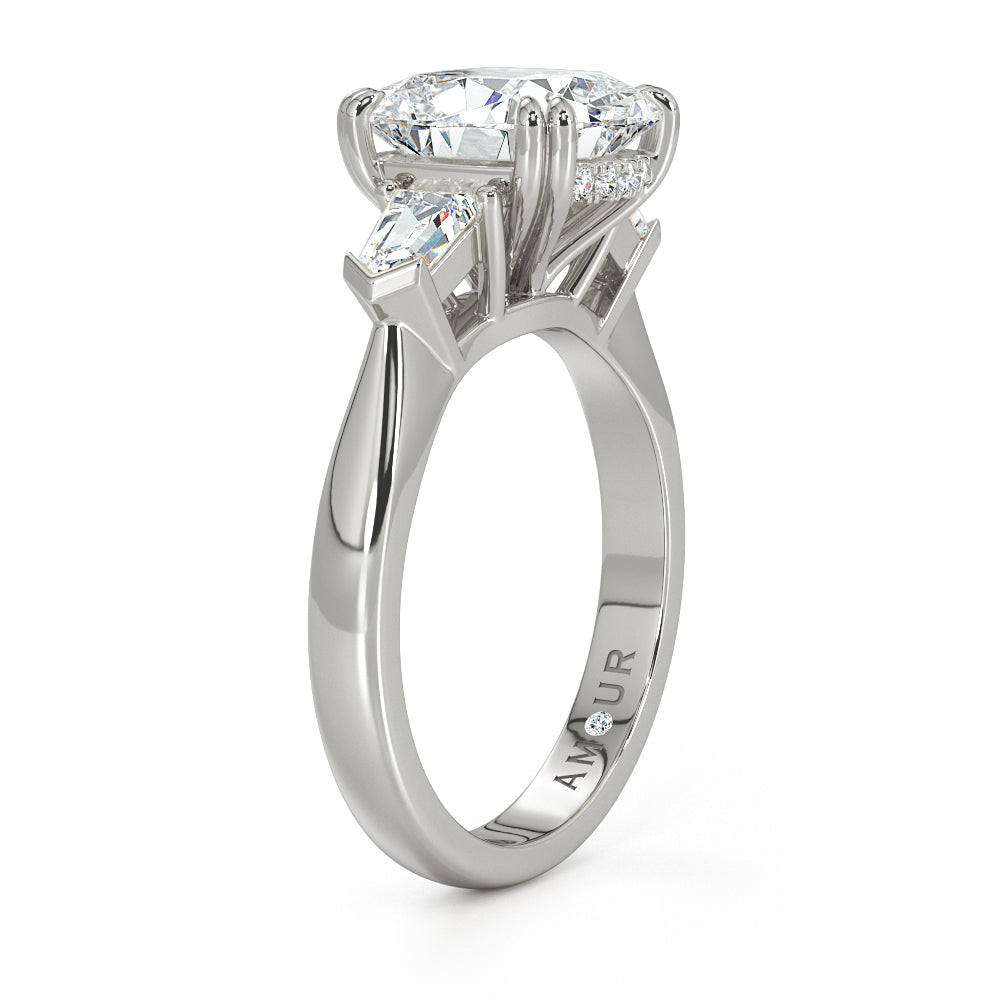 18k white gold cushion cut with diamond set gallery rail and tapered bullet cut diamond shoulders