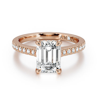 Emerald cut with pave set diamond shoulders and hidden halo