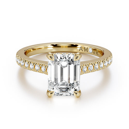 Emerald cut with pave set diamond shoulders and hidden halo