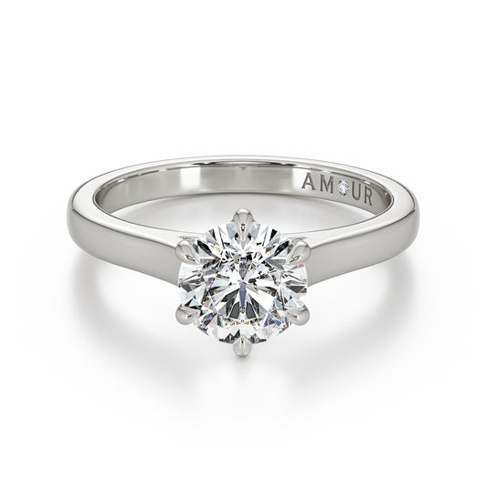 Round brilliant six claw solitaire & cathedral shoulders