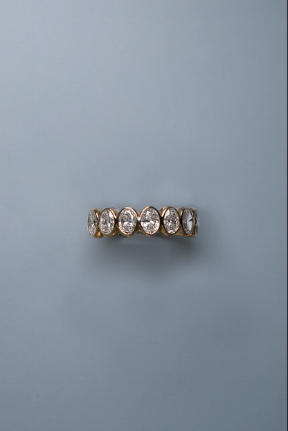 Bezel set Oval Cut half-eternity Band (0.30ct each)