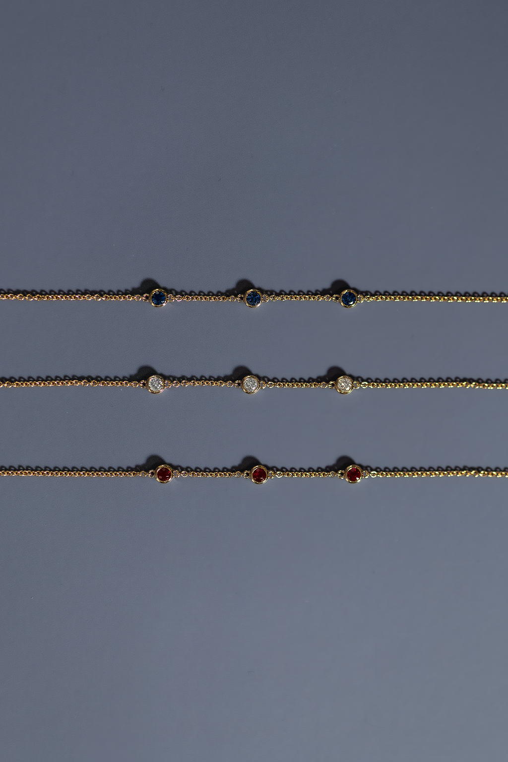 The Trio Gemstone (in Sapphire Ruby or Diamond)