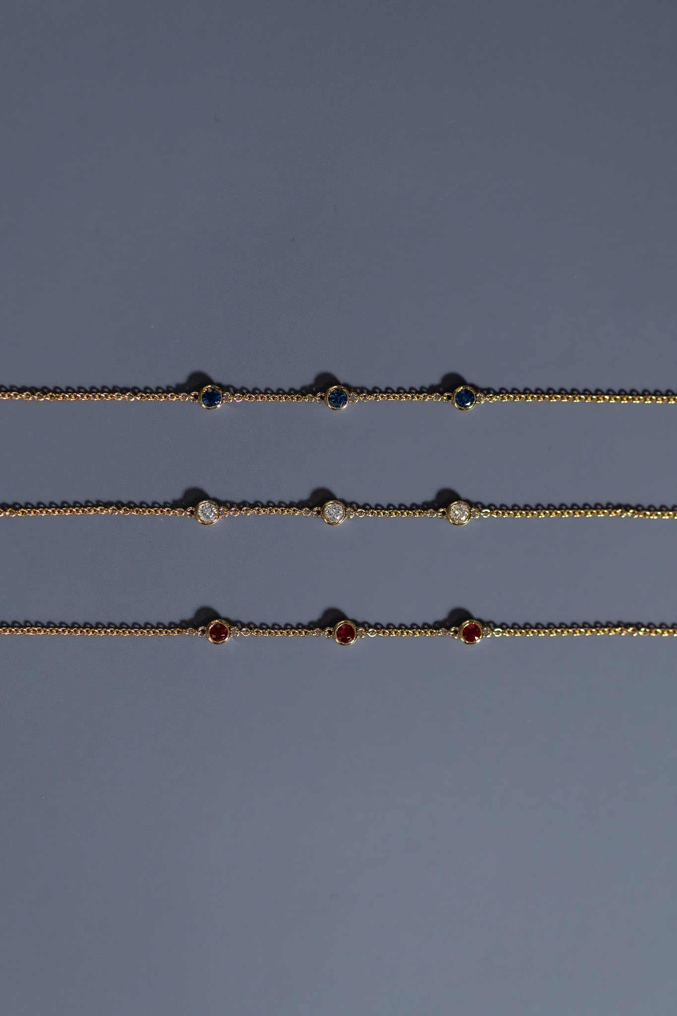 The Trio Gemstone (in Sapphire Ruby or Diamond)