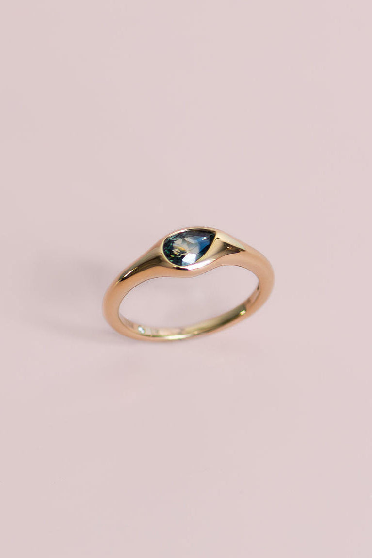 0.75CT Pear Parti Sapphire Asymetrical Bezel Set