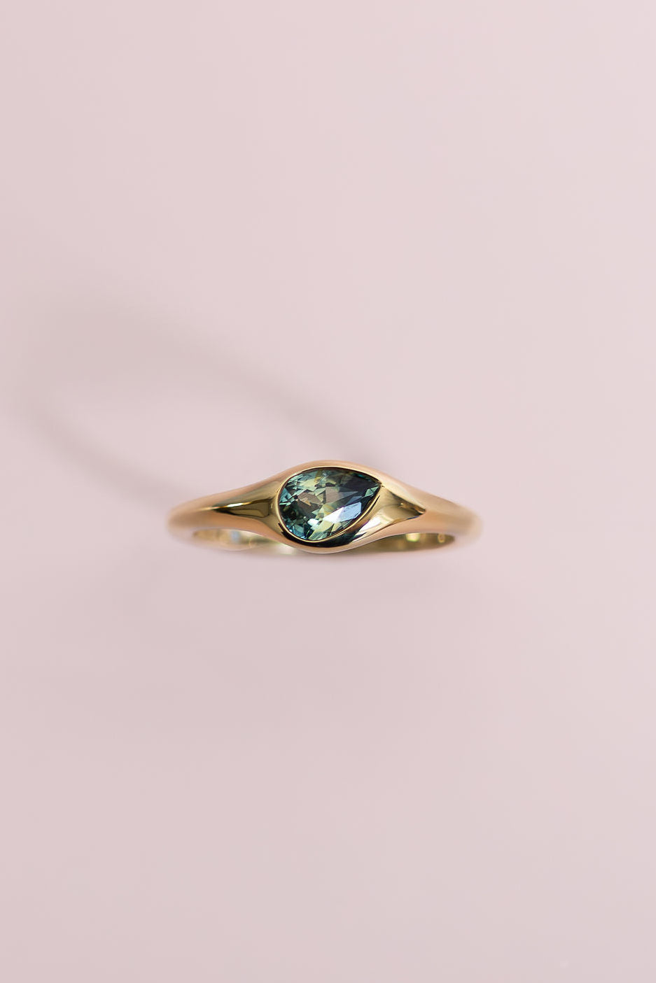 0.75CT Pear Parti Sapphire Asymetrical Bezel Set