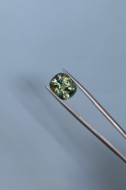 8.27ct Green/Yellow Cushion cut Sapphire