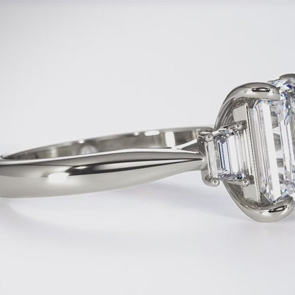 Emerald cut with trapezoid cut shoulder stones
